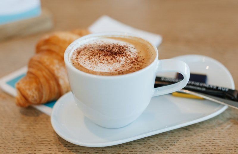 A Parisian espresso and a golden croissant